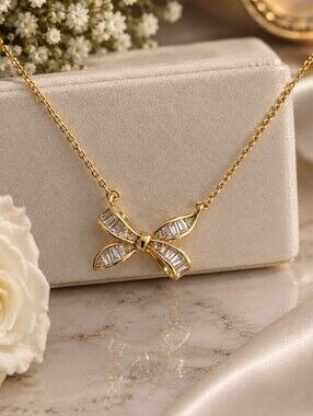 bp Gold Bow Pendant Necklace with Clear Stones
